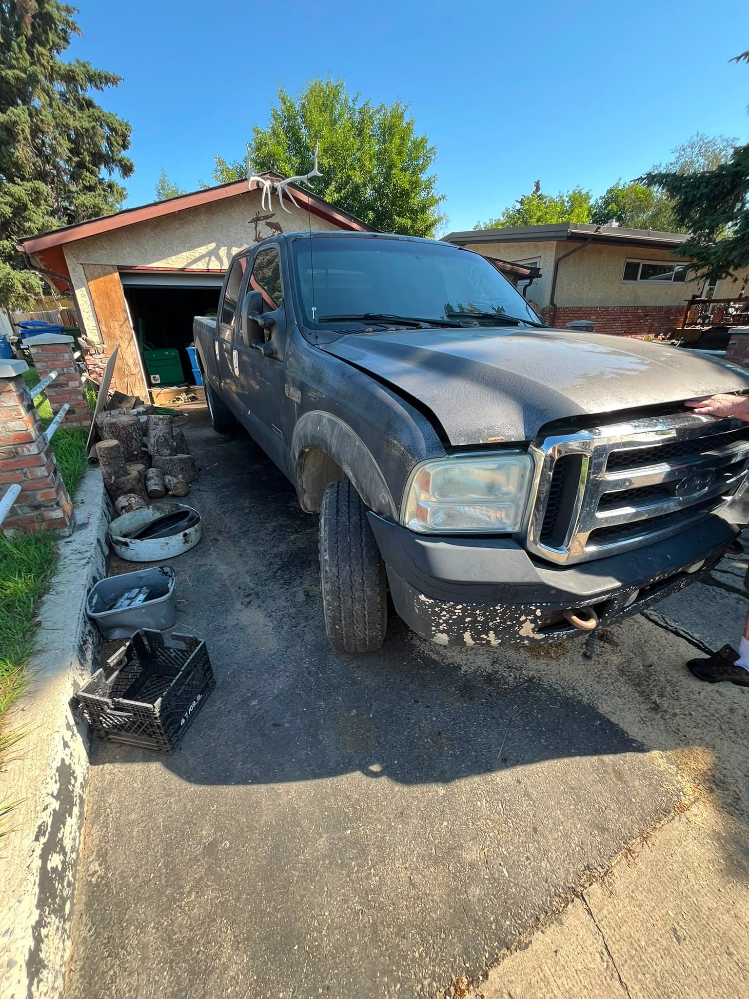 Tow truck carrying a damaged vehicle